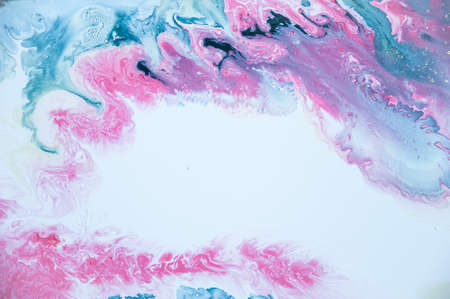 Abstract colorful background. Drawing with acrylic paints on water. Texture play of paint.の写真素材