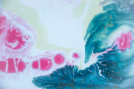 Abstract colorful background. Drawing with acrylic paints on water. Texture play of paint.の写真素材