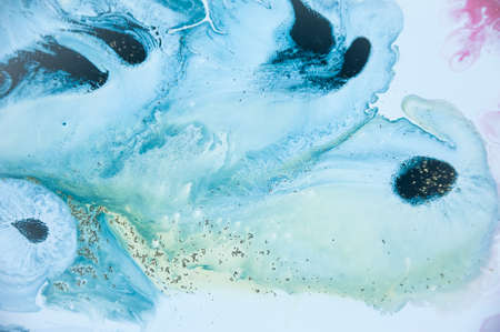 Abstract colorful background. Drawing with acrylic paints on water. Texture play of paint.の写真素材