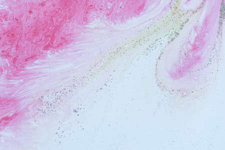Abstract colorful background. Drawing with acrylic paints on water. Texture play of paint.の写真素材