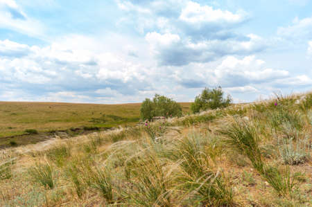 Tourist places of Russia. Beautiful landscapes of the world. Limestone pits against the bright sky and cloudsの写真素材