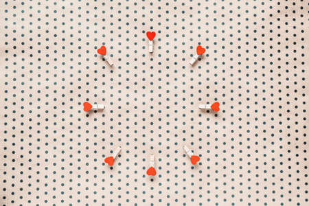 hearts on a crafting polka dot background. Holidays concept. Flat lay, top view, copy space. Valentine's Day background. の写真素材