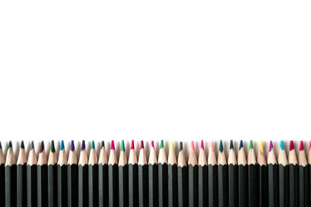Colored wooden pencils on white isolated background. Top view, Flatlayの写真素材