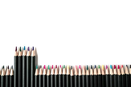 Colored wooden pencils on white isolated background. Top view, Flatlayの写真素材