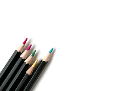 Colored wooden pencils on white isolated background. Top view, Flatlayの写真素材