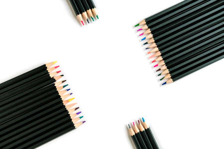 Colored pencils on white background. Isolate.  Beautiful design for the text. Stationery backgroundの写真素材