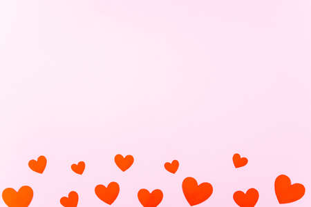 Pink background for Valentine's day with hearts, space for text.の写真素材