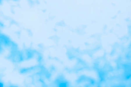 Blurred abstract background of silver and blue sequins.の写真素材