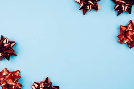 Blue background with gift bows for Valentine's day. Space for textの写真素材