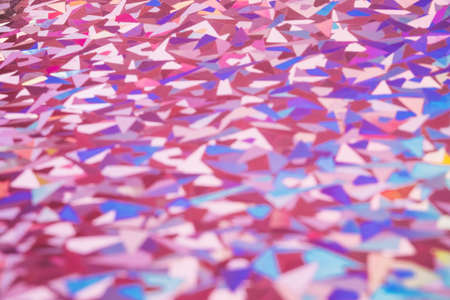 Abstract background with blurred holographic shapes.