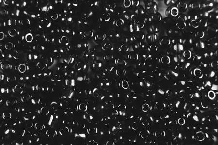 black and white background of small beads. Copyspaceの写真素材
