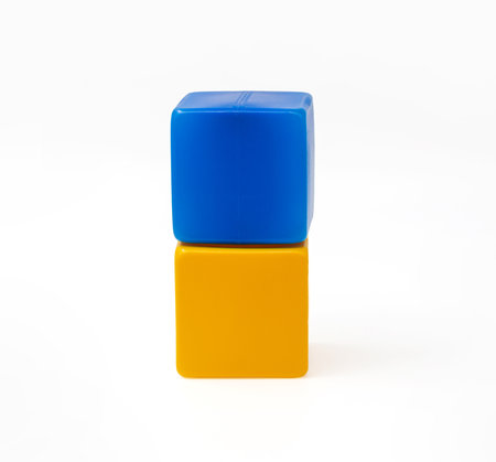 Yellow and blue plastic cubes for childrens playの写真素材