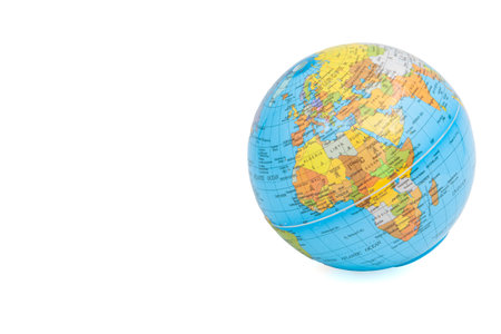 Model of the world lying on its side, globe or Earth isolated on a white background. Africa, Europe,...