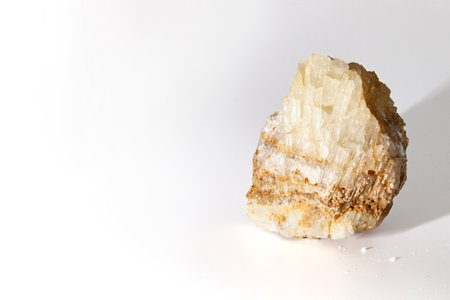 Quartz crystal isolated on white background, semi-precious stones or gemstone design elements, side view. For text. horizontalの写真素材