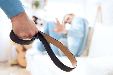 Close-up shot of a hand with a strap.の写真素材