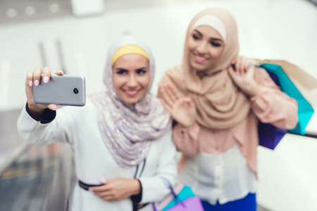 Young Arabian Women Taking Selfie in Modern Mall.の写真素材
