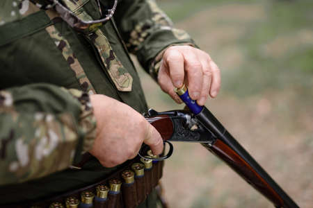 Old Experienced Hunter Charging Smooth Bore Gun.