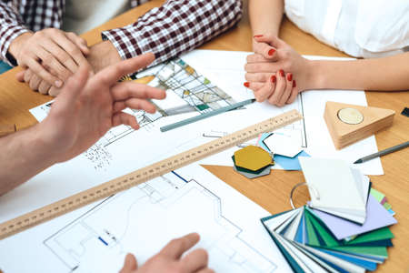 Group of designers architects discuss project.の写真素材