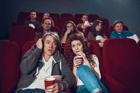 People came to see a horror movie in the cinema.の写真素材