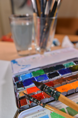 Box of watercolors with two brushesの写真素材