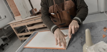 Trunk Maker at work in his luxury leather workshop, France