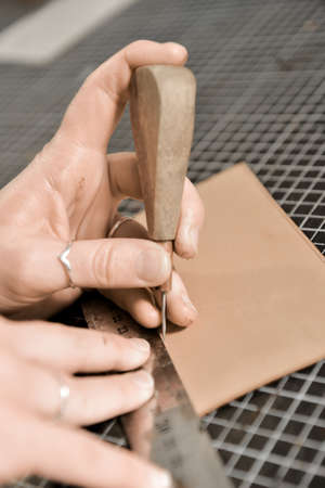 Trunk Maker at work in his luxury leather workshop, Franceの写真素材
