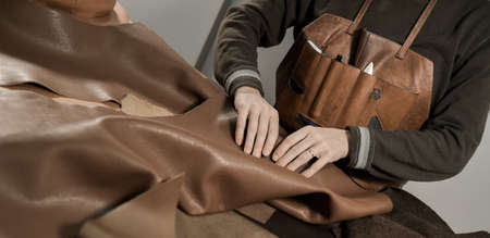 Trunk Maker at work in his luxury leather workshop, Franceの写真素材