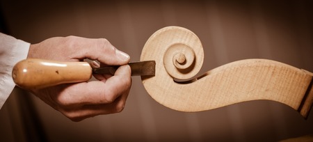 Craftsman working in workshop lutemaker, Violin makerの写真素材