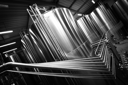 Stainless steel tank at the winery for wine maturationの写真素材