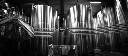 Stainless steel tank at the winery for wine maturationの写真素材