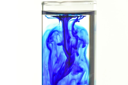 Methylene blue fall in water in glass tube Medicalの写真素材