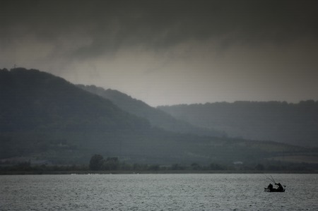 Storm and Rain over lake, France, Franceの写真素材