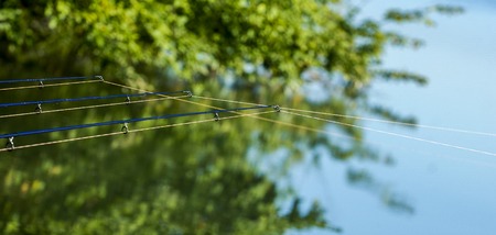 Fishing rod in the lake, waiting for the key, Franceの写真素材