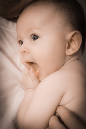 Portrait of a baby at home in her room, Franceの写真素材