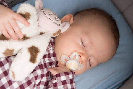 Portrait of a baby at home in her room, Franceの写真素材
