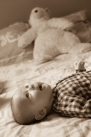 Portrait of a baby at home in her room, Franceの写真素材