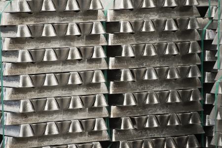 Stack of raw aluminum ingots in aluminum profiles factory, France