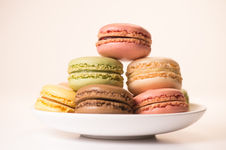 Cake macaron or macaroon isolated on white background, sweet and colorful dessertの写真素材