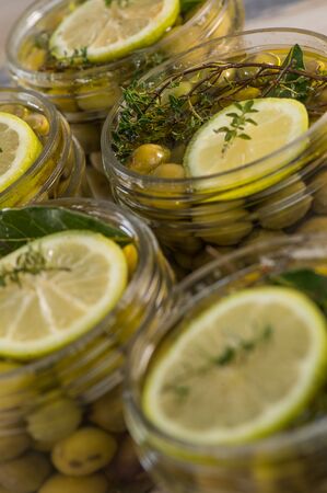 Green olives preserved in jar, preserveの写真素材