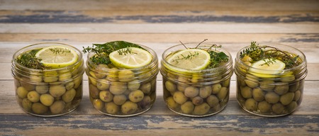 Green olives preserved in jar, preserveの写真素材