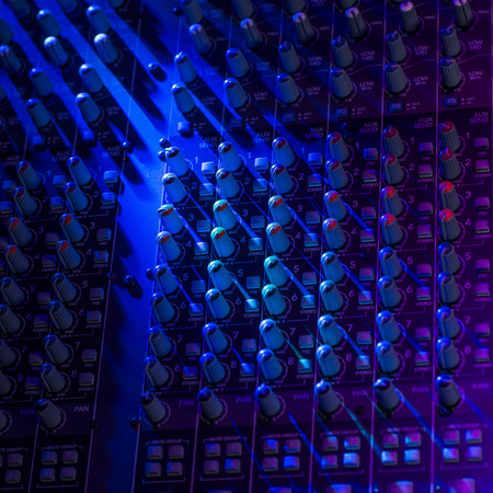 Sound music mixer control panel on colourful light, Franceの写真素材