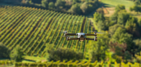 Drone flying above beautiful landscape with vineyards, Franceの写真素材
