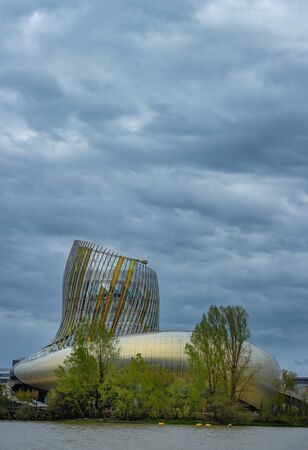 BORDEAUX, FRANCE APRIL 2018: La Cite du Vin, the wine museum of Bordeaux near to Garonne River. Bordeaux, Aquitaine, Franceのeditorial素材