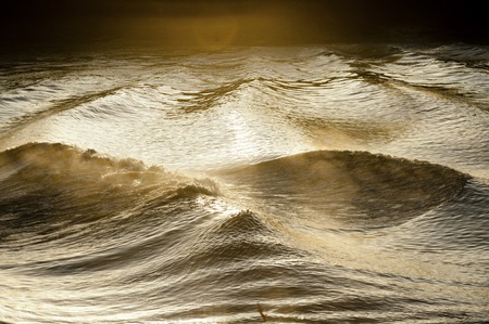 Mascaret, close-up amazing wavy trace on Garonne river at sunset, Gironde, Franceの写真素材