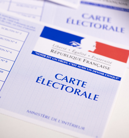 French electoral voter cards official government allowing to vote paper on white backgroundの写真素材