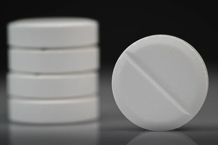 White pill rotate on a black background, Macro shotの写真素材