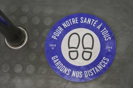 Sticker in Paris Metro during Covid-19 pandemic