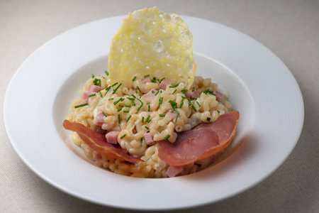 Pastasotto recipe with shells and ham, ham and cheese tilesの写真素材