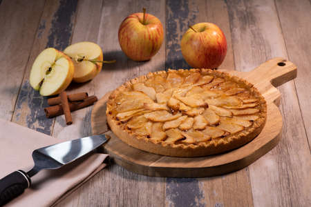 Delicious apple pie on a wooden table, from aboveの写真素材