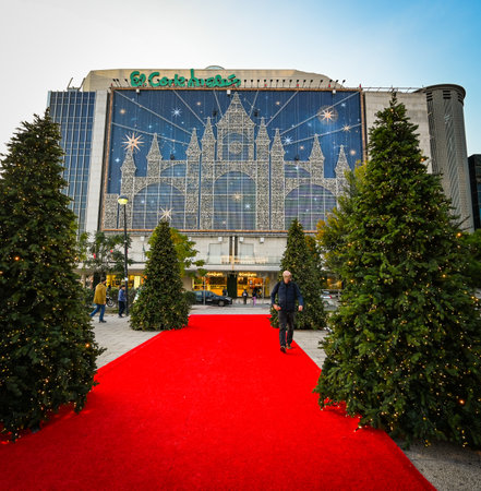 Madrid, Spain, Nov 18, 2023, Red carpet and Christmas trees at the Christmas Market in front of El Corte Ingles shopping centreのeditorial素材